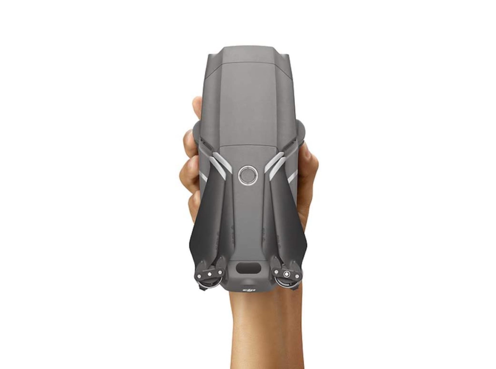 A hand grips a folded DJI Mavic 2 Pro against a plain white background.