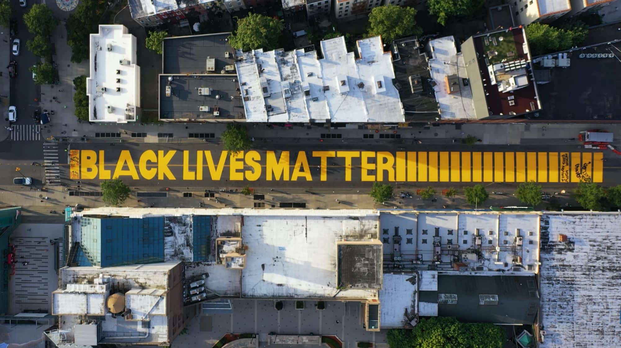 Drone photo of the Black Lives Matter mural painted across a Brooklyn street.