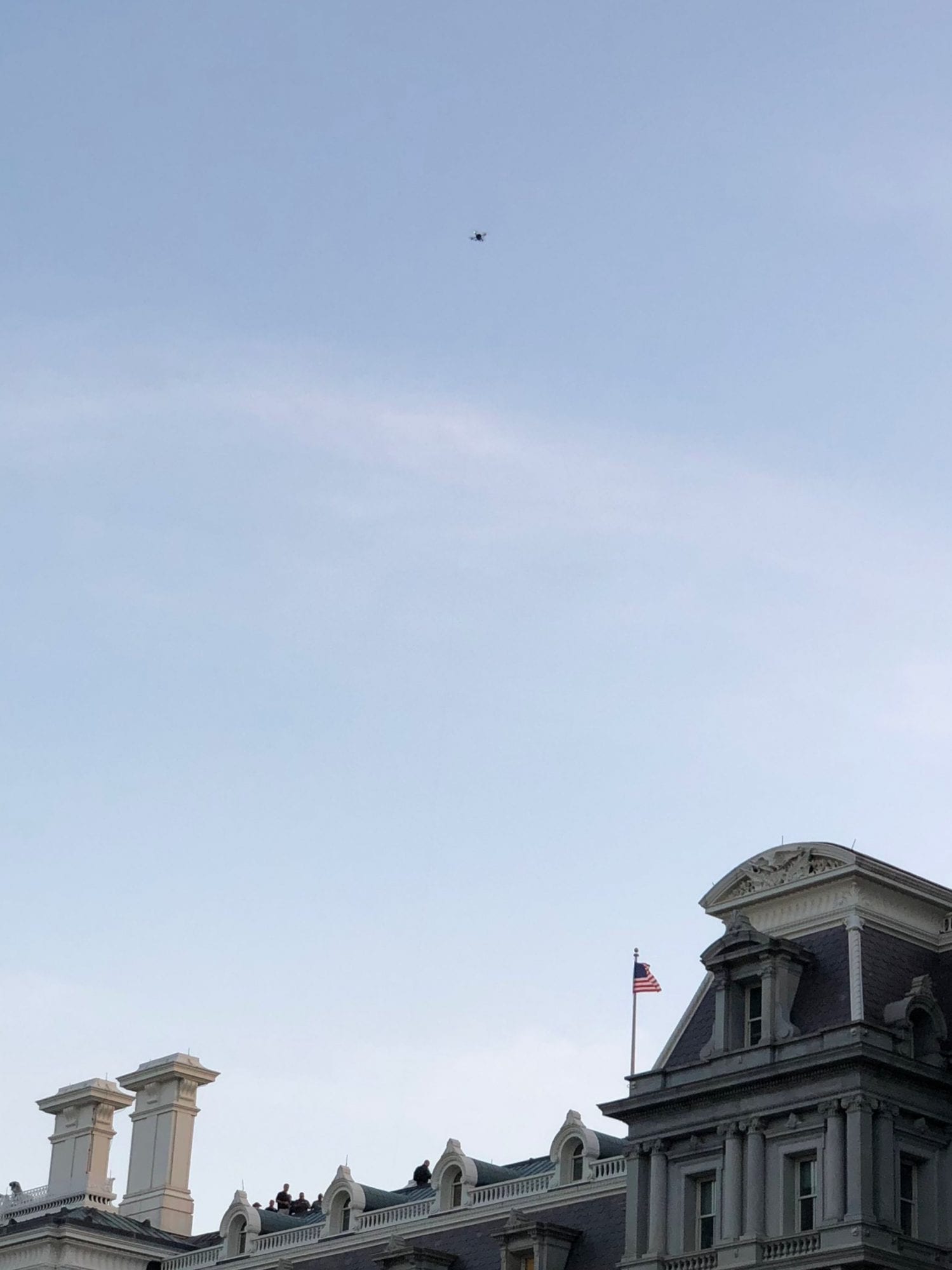 Secret Service drone resembling a DJI Matrice 200 flying over the Eisenhower Executive Office Building.