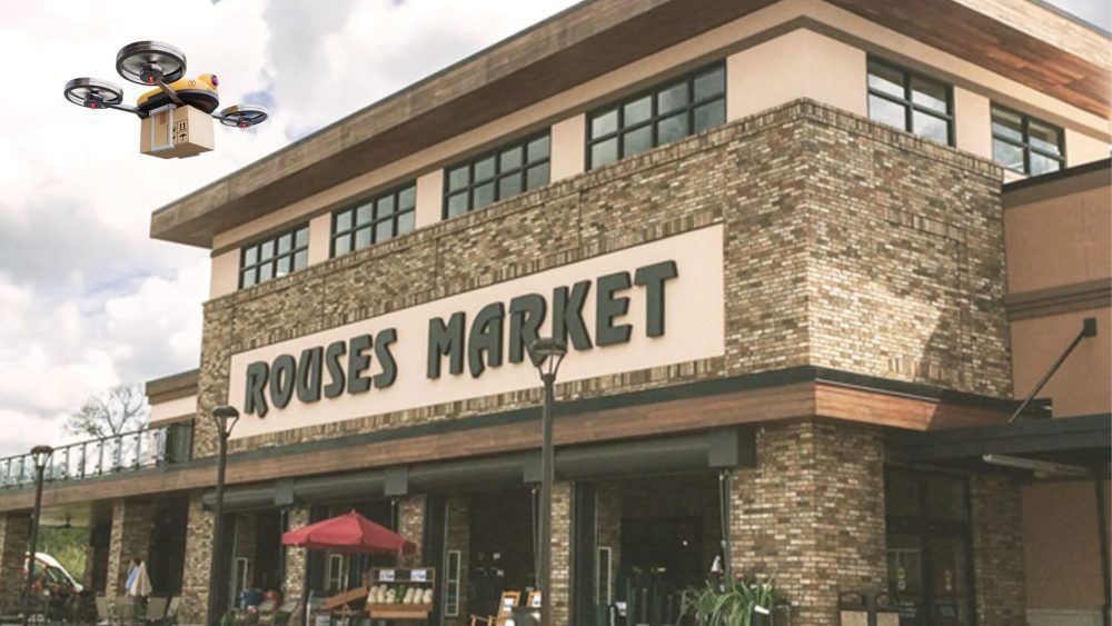 Rouses Market storefront with an illustrated delivery drone composited above the roofline.