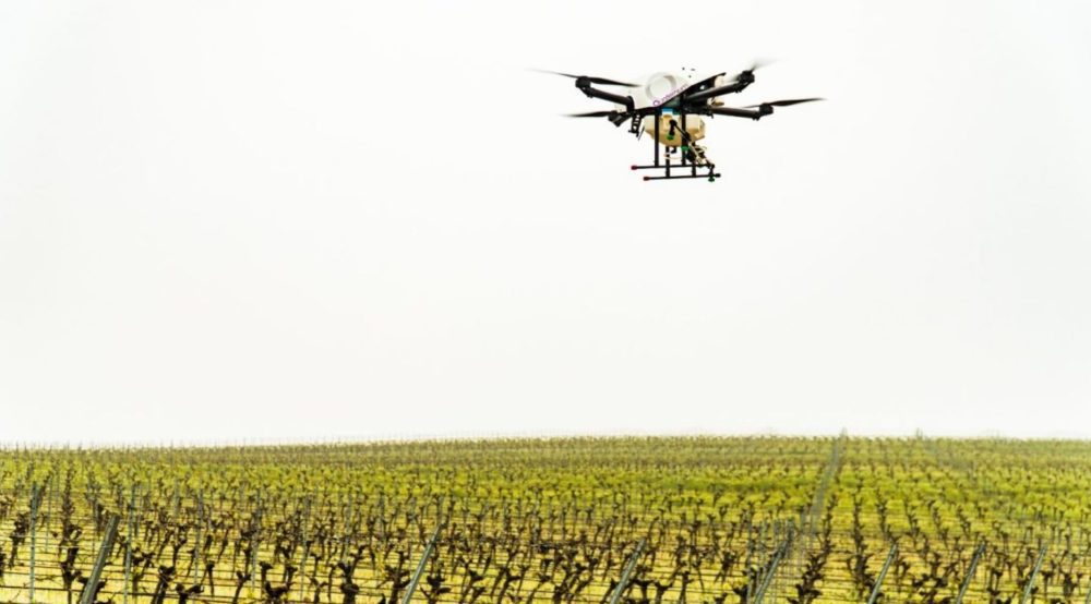 Quaternium HYBRiX spraying drone, which flies over an hour carrying 2.6 gallons (10 liters) of liquid.