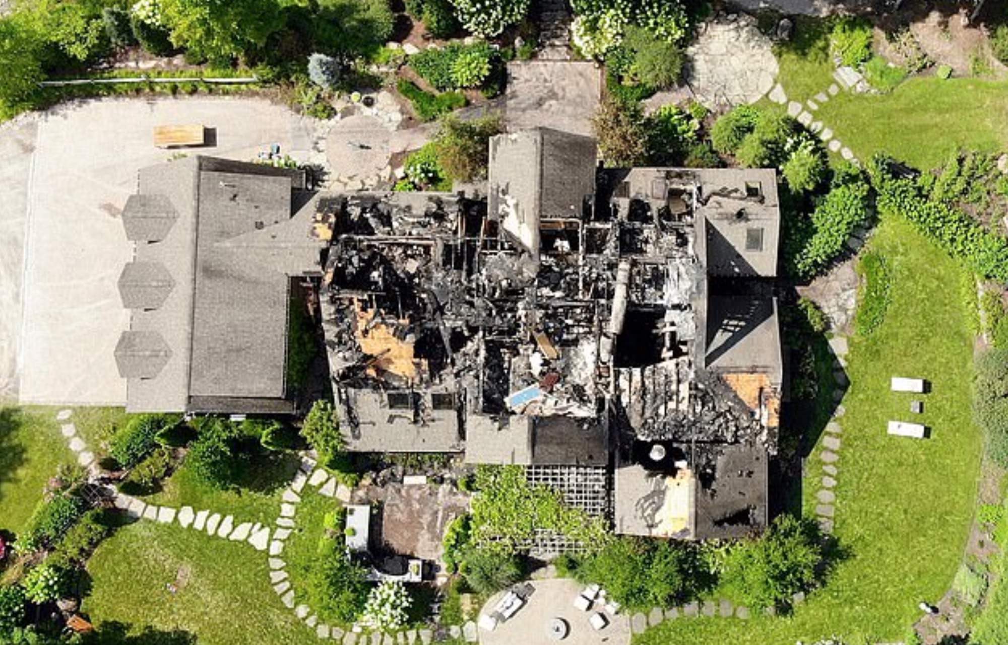 Drone view of fire damage to Rachel Ray's upstate New York mansion.
