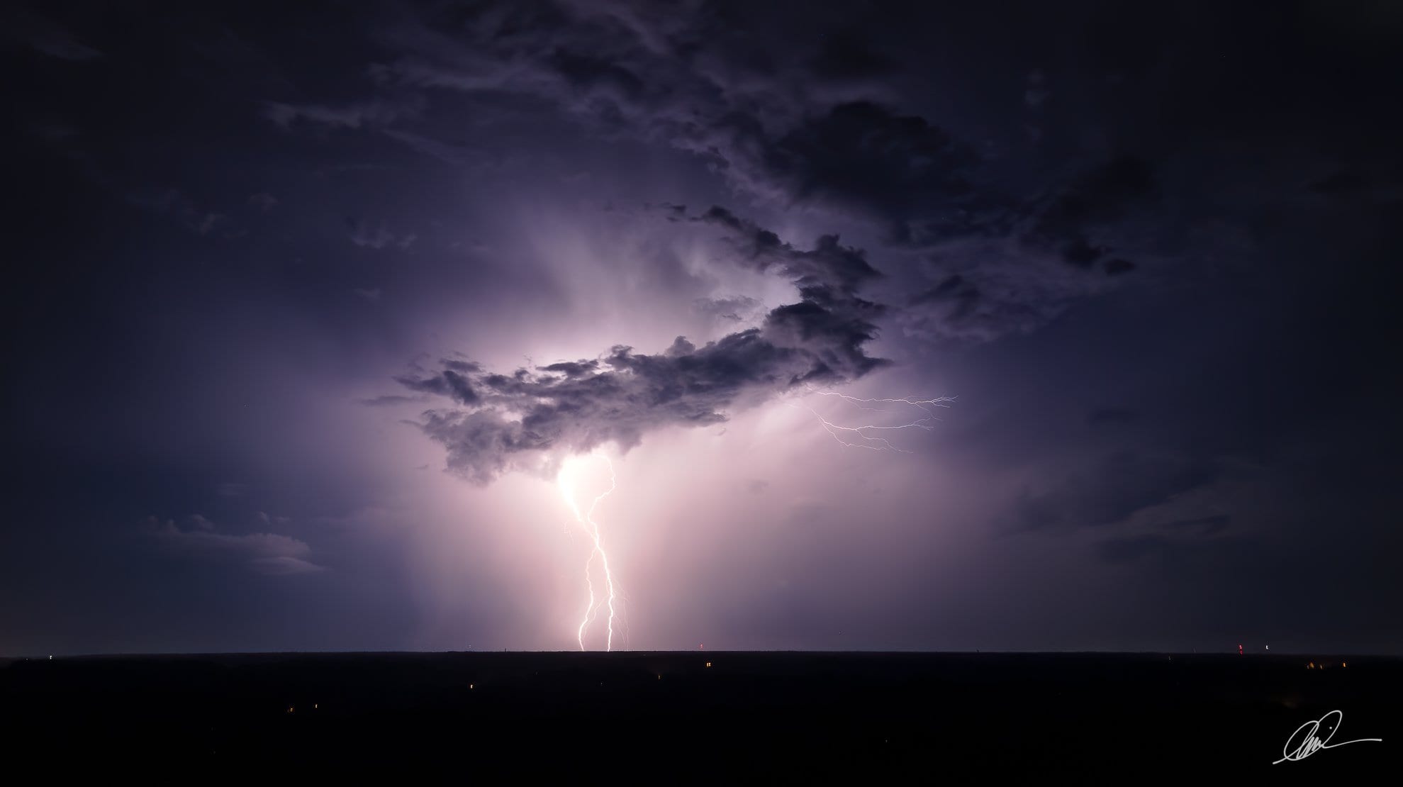 Lightning strikes captured in a long exposure aerial photo taken with a DJI Mavic Air 2.