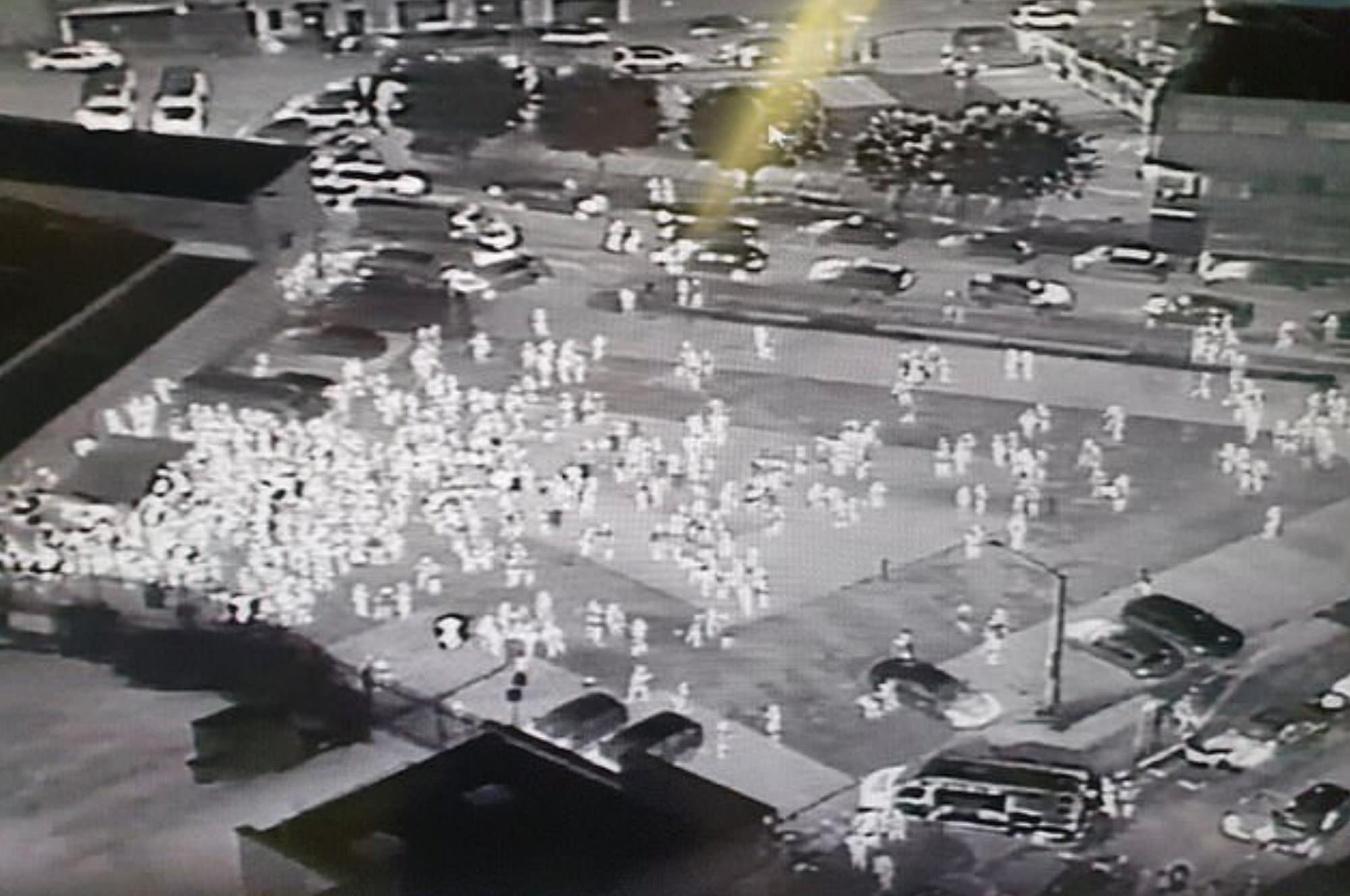 Police thermal drone image of crowds at an illegal rave in Birmingham, UK.