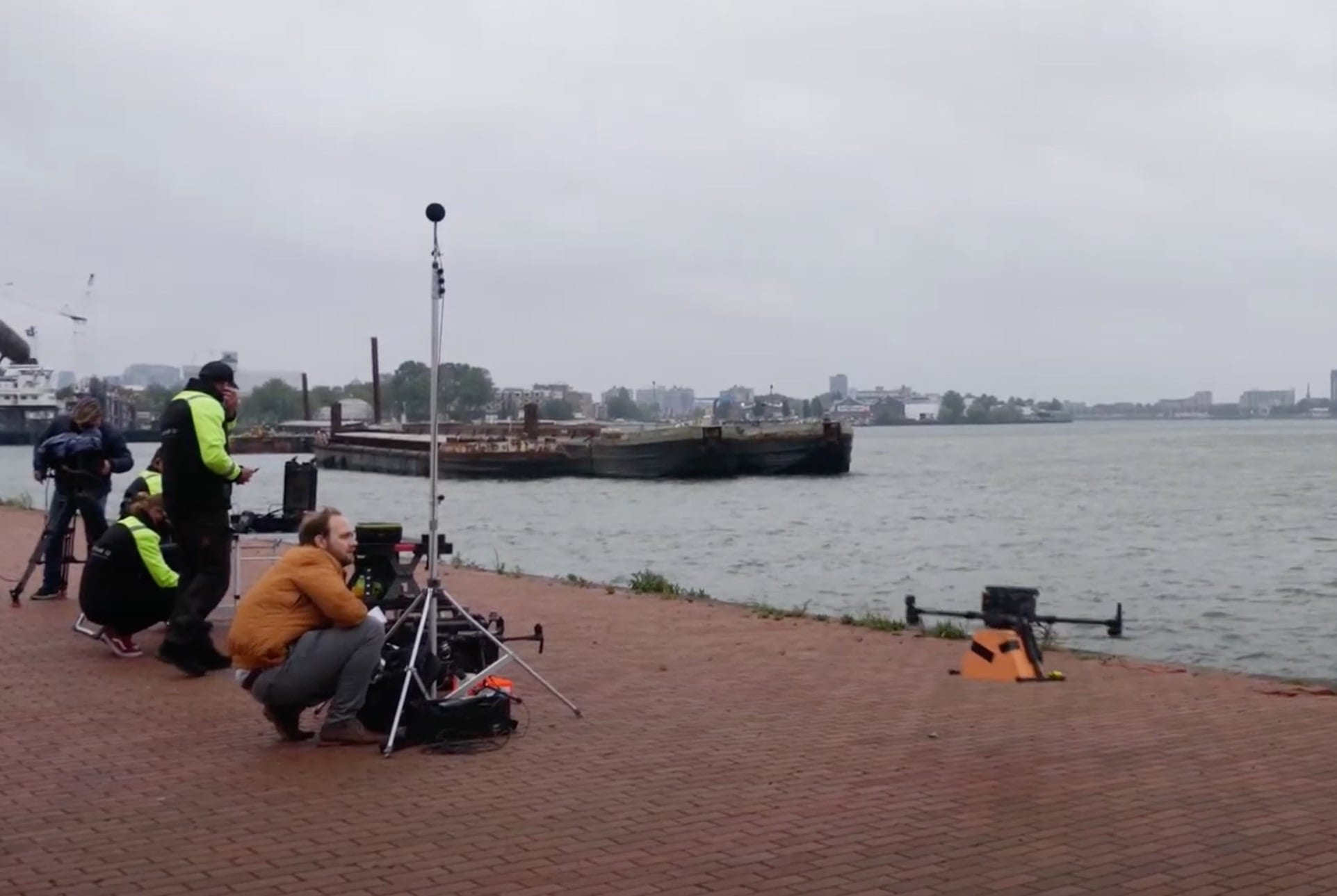 DJI Matrice 300 drone delivering a package to the moving inland vessel Duancis in Rotterdam.