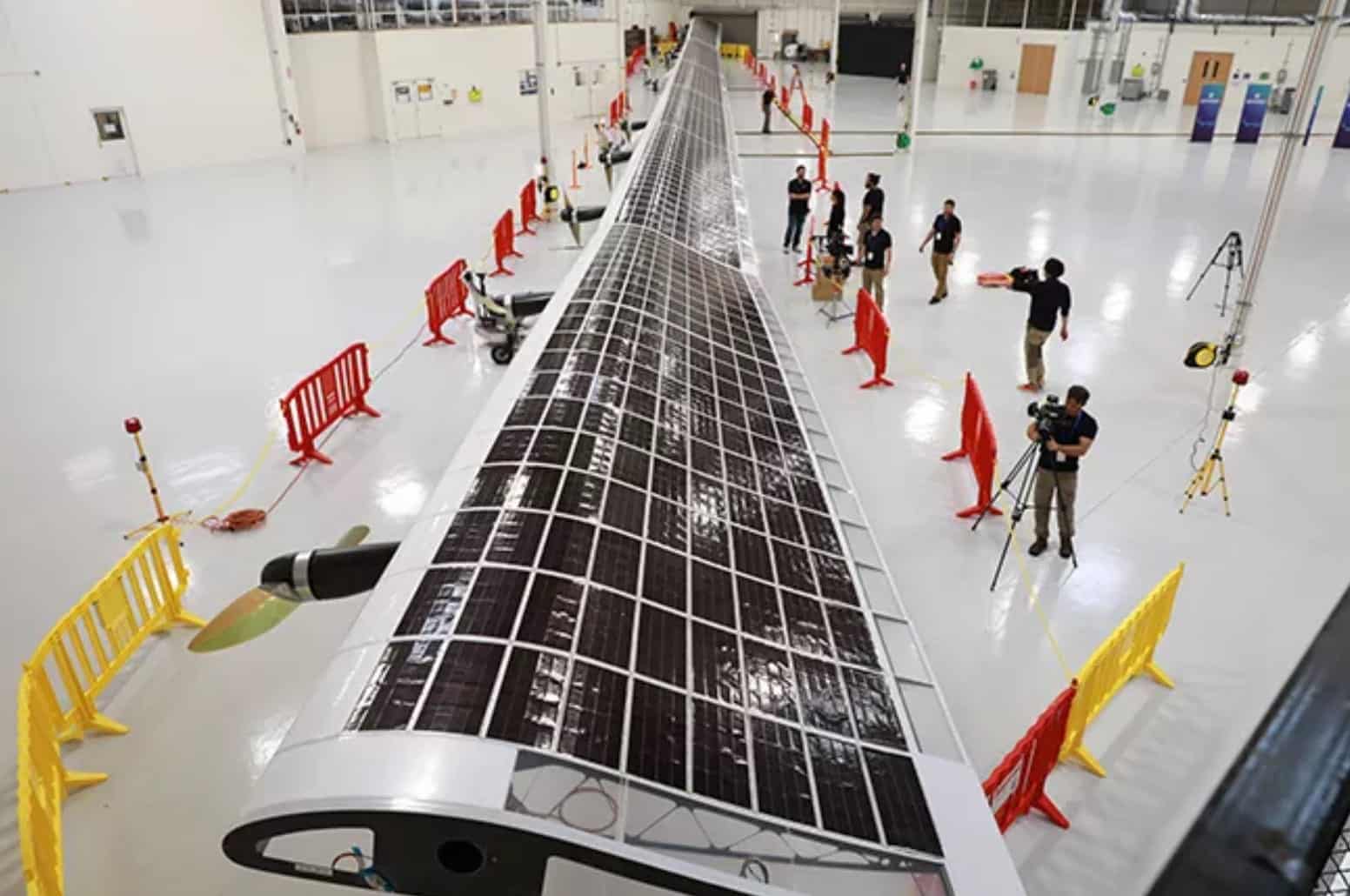 The Sunglider's solar-covered wing, about 255 feet (78 meters) across, carrying ten propellers.