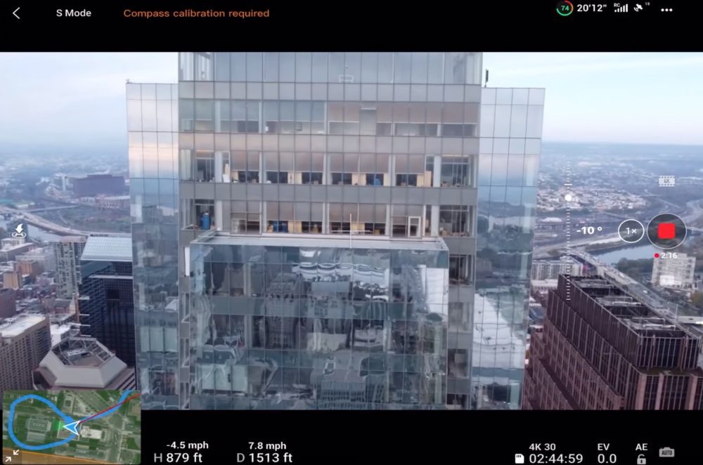 Screenshot of a drone flight app filming a glass tower at 879 feet (268 meters).