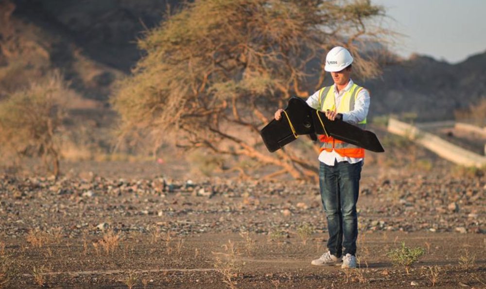 Drone surveying a construction site as UAE builders adopt digital technologies.