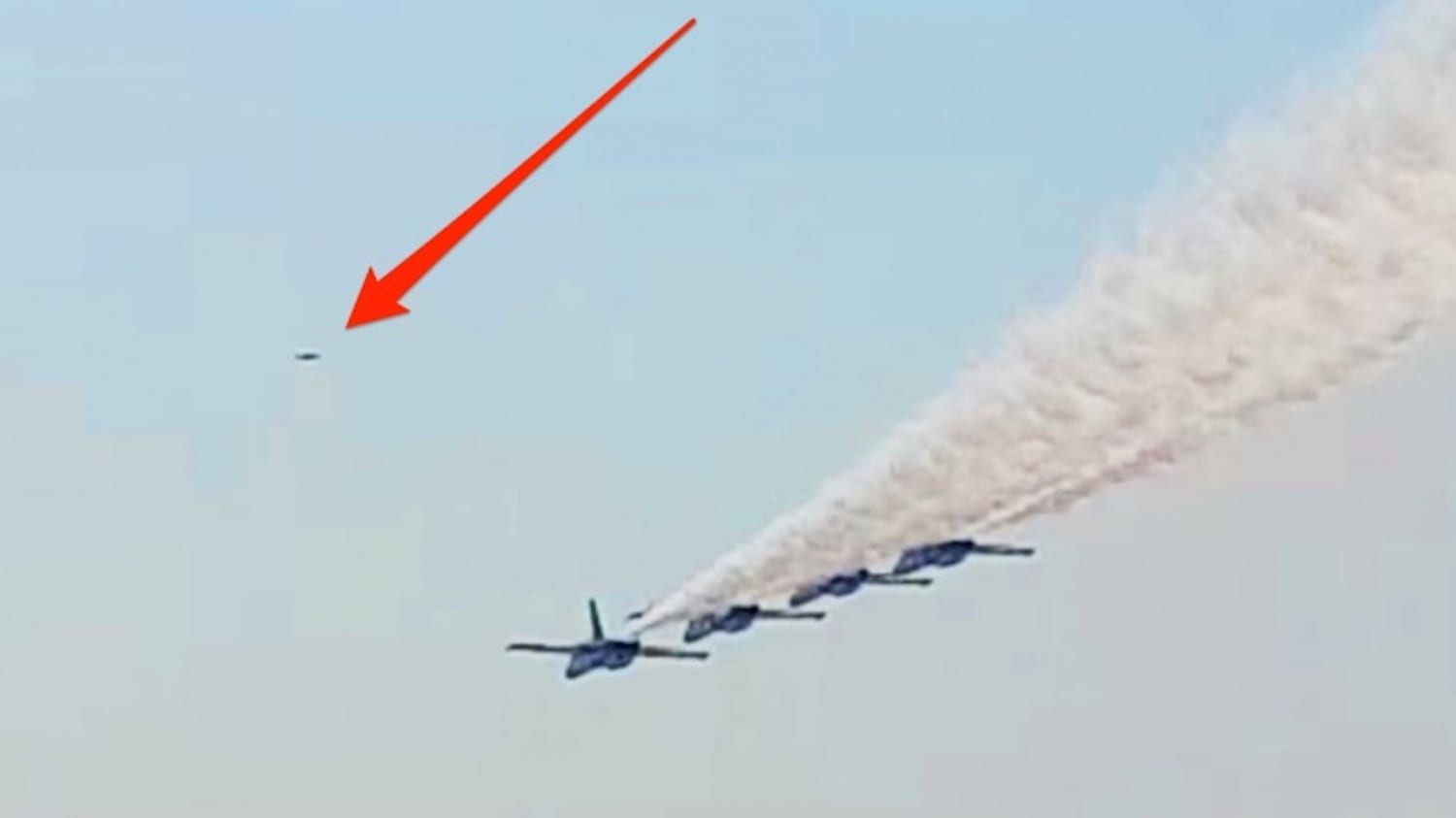 Blue Angels formation with a red arrow marking a drone in the sky.