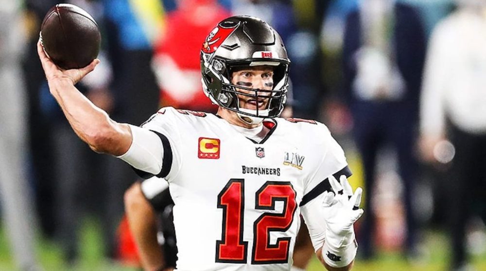 Buccaneers quarterback in a number 12 jersey throwing during Super Bowl LV.