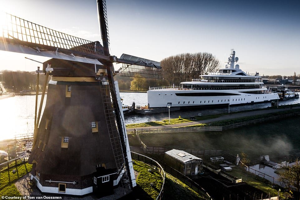 The 308-foot (94-meter) Feadship superyacht Viva moving through Holland.