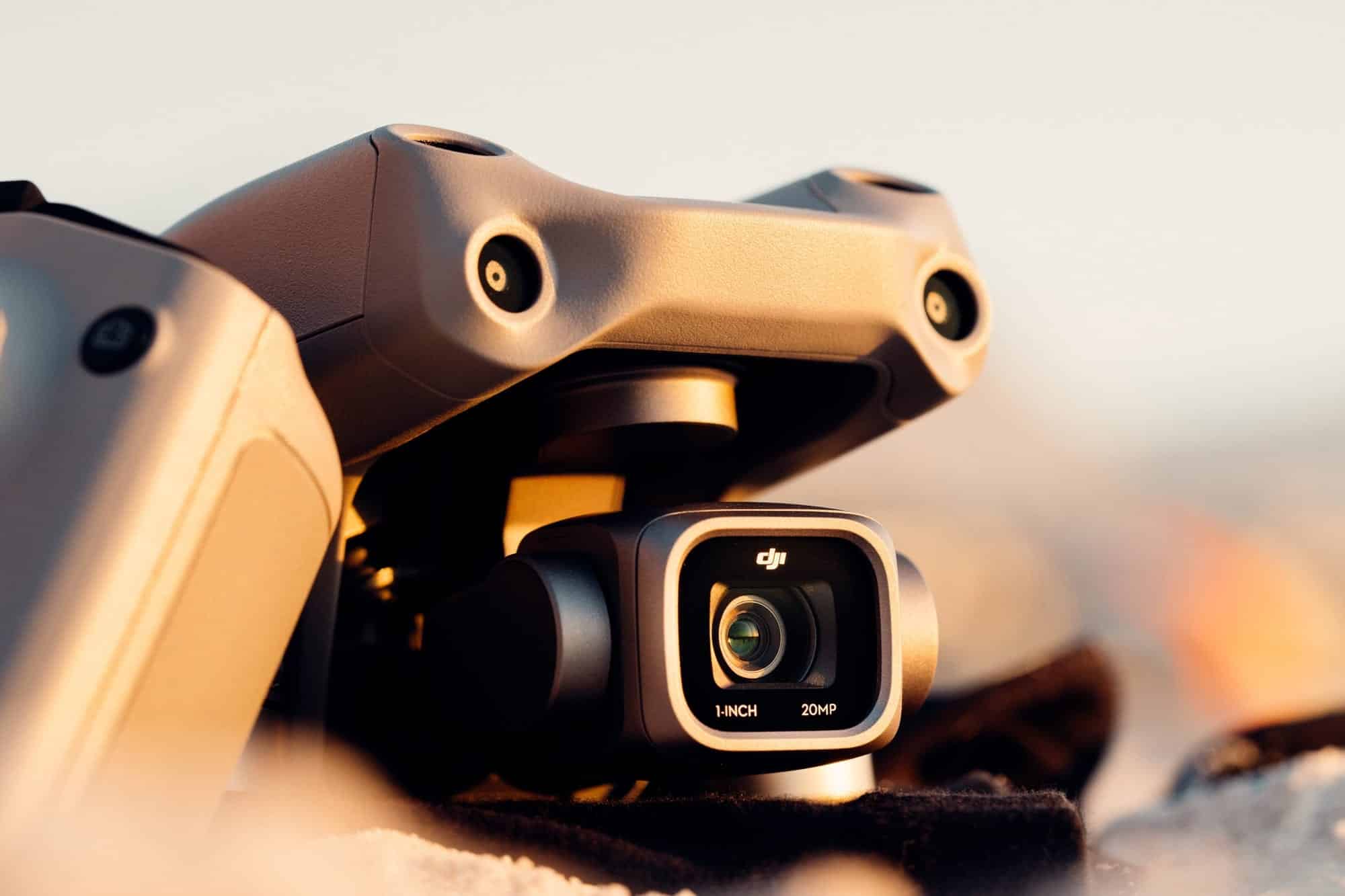 Close-up of the Air 2S gimbal camera marked 1-INCH 20MP at sunset.