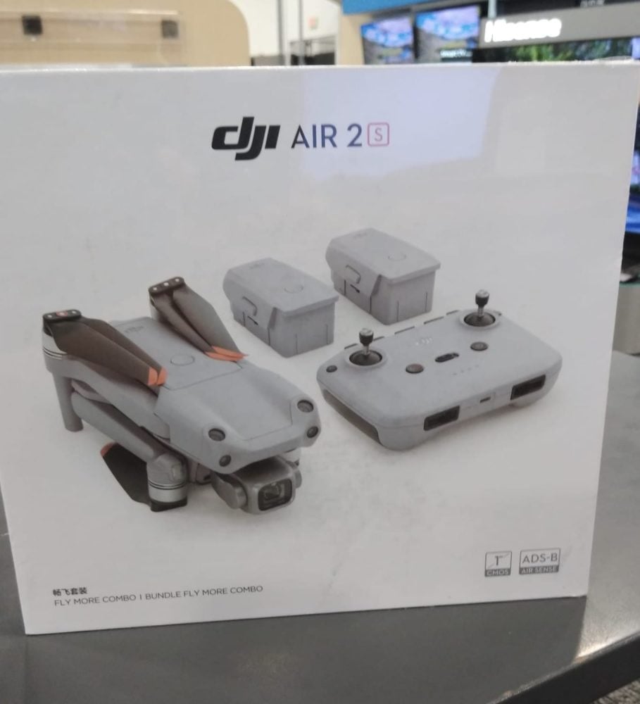Retail box for the DJI Air 2S Fly More Combo photographed on a store shelf.