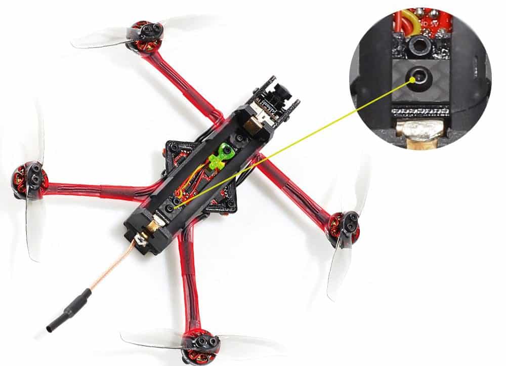 Rekon 3 nano FPV quad on a red frame with an inset camera close-up.