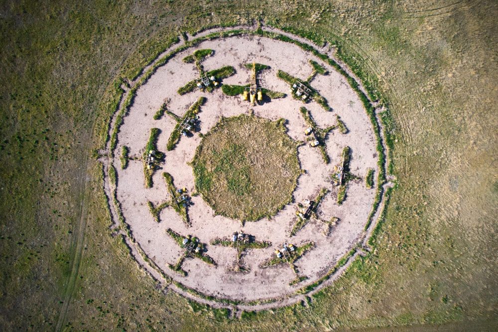The circular memorial seen from above in the fields near Cayley, Alberta.