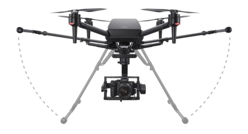 Sony Airpeak S1 in flight with an Alpha full-frame camera slung below.
