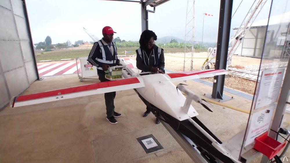 Zipline Ghana staff loading vaccine cargo before an autonomous run.