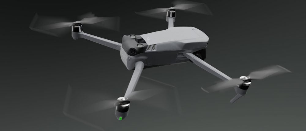 Rendering of the DJI Mavic 3 in flight, seen from the side.
