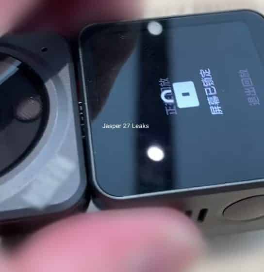 Close-up of the Action 2 front touchscreen module showing a Chinese-language prompt.