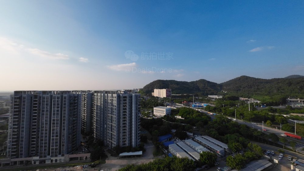 Leaked sample photo of Chinese apartment towers and hills said to be from the Action 2.