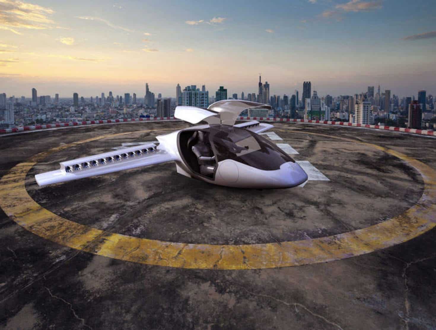 Render of a white eVTOL air taxi resting on a rooftop helipad above a city.