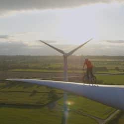 MacAskill lands a trick inside the wind turbine factory for the Climate Games Challenge.
