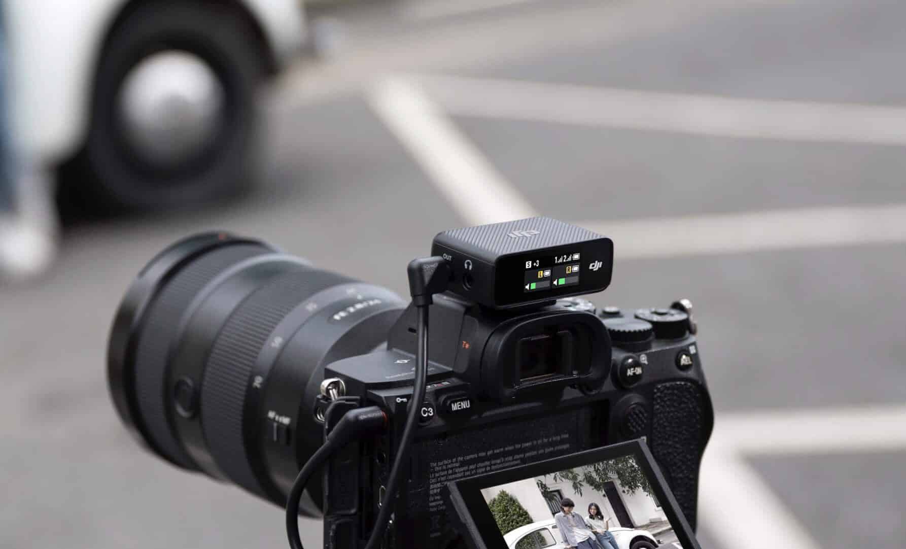 A DJI Mic transmitter clipped to clothing for wireless 2.4 GHz recording.