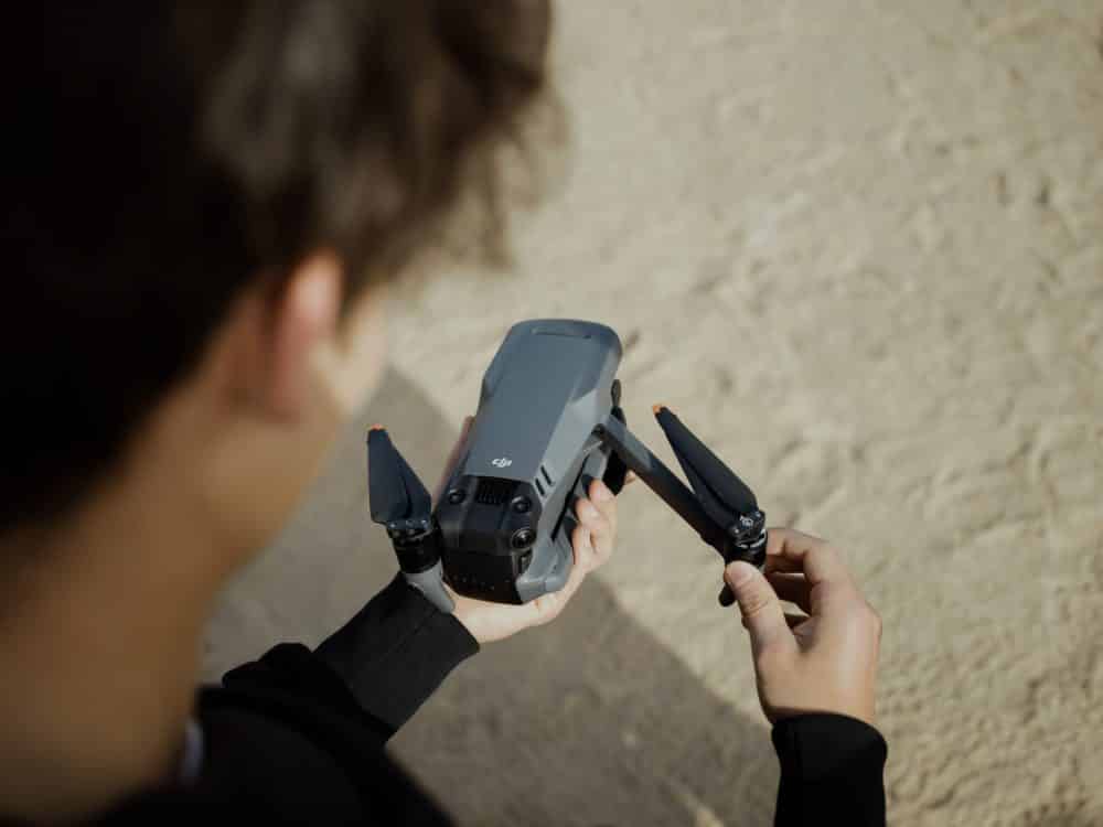 DJI Mavic 3 filming a drifting car during DJI's launch photo shoot.