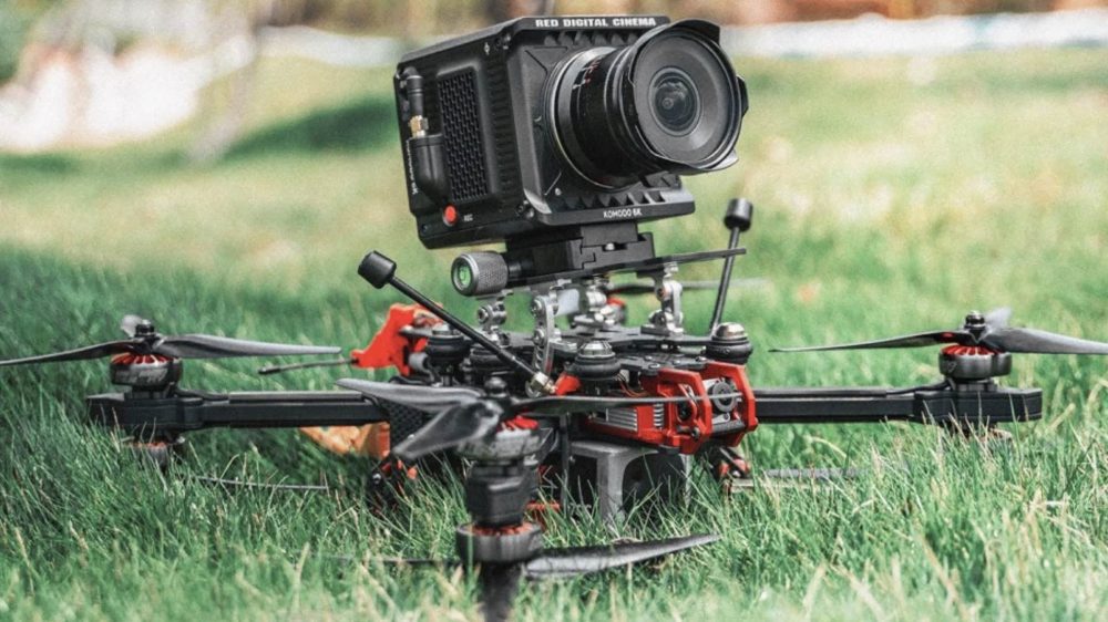 The RED Komodo 6K mounted on a cinelifter FPV drone flown by Johnny FPV.
