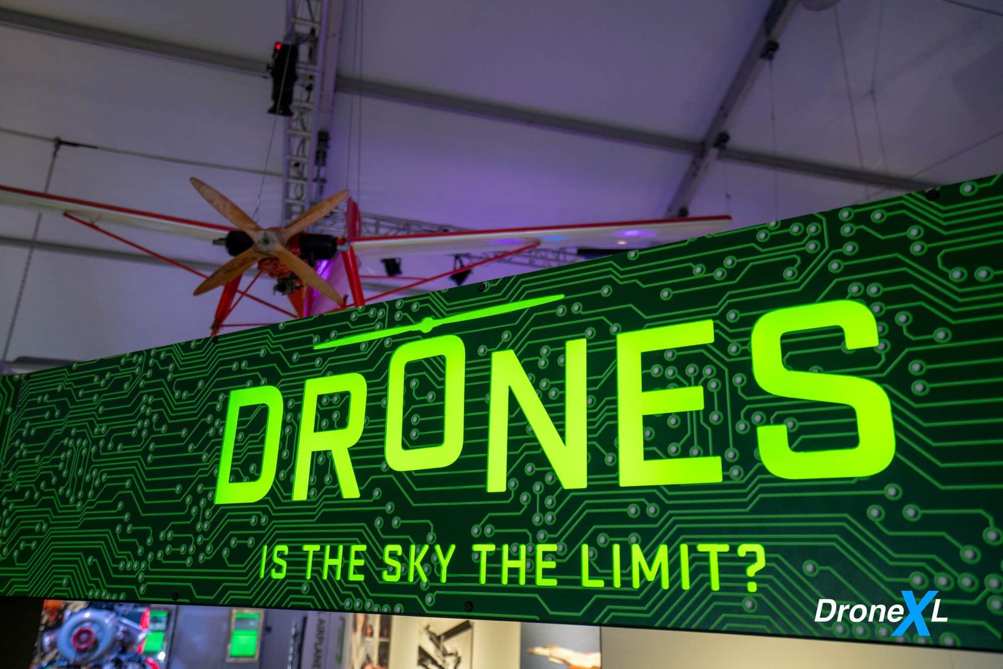 Museum exhibit sign reading Drones Is The Sky The Limit at the Intrepid.