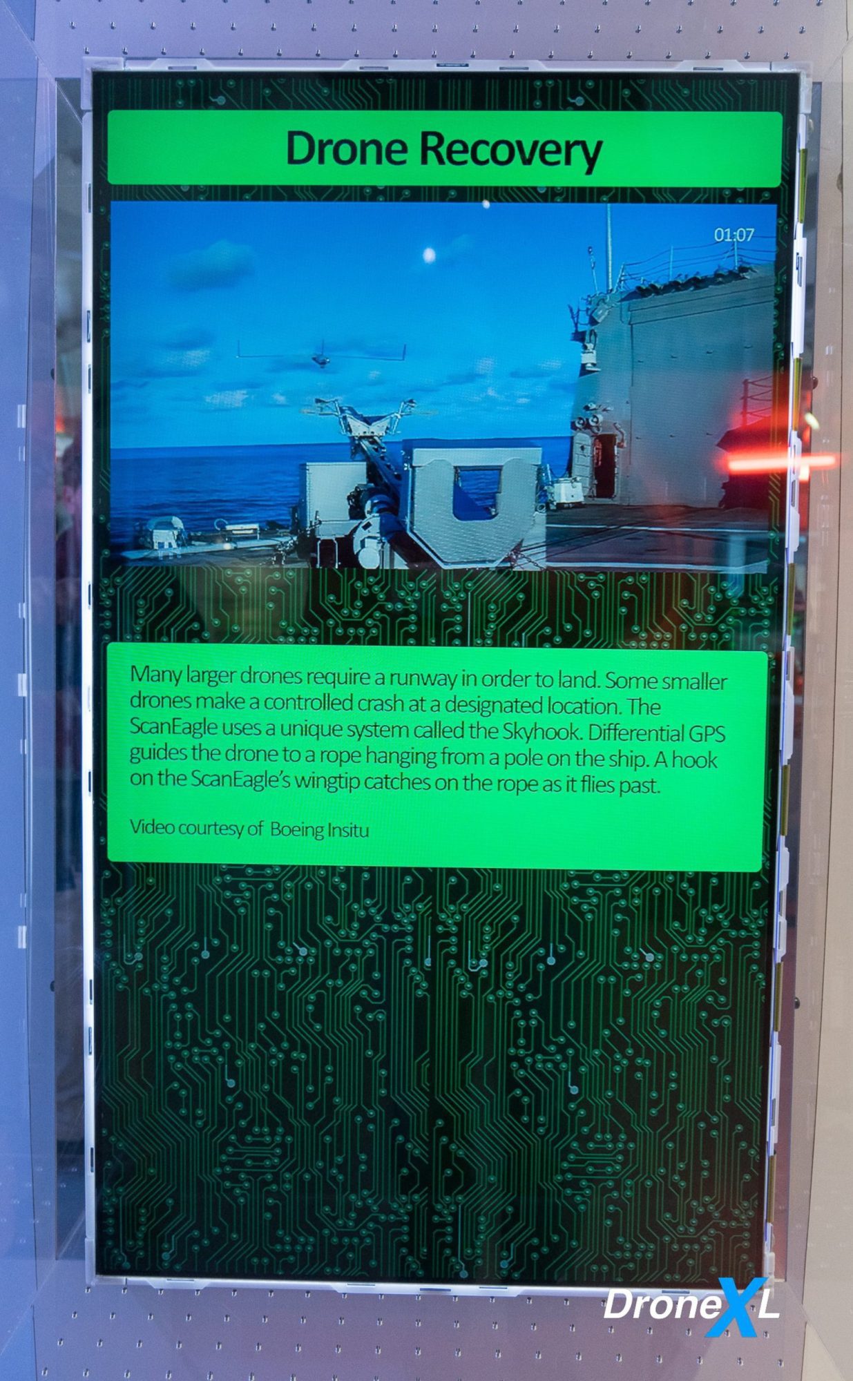 Display showing how differential GPS guides the ScanEagle onto a shipboard recovery rope.