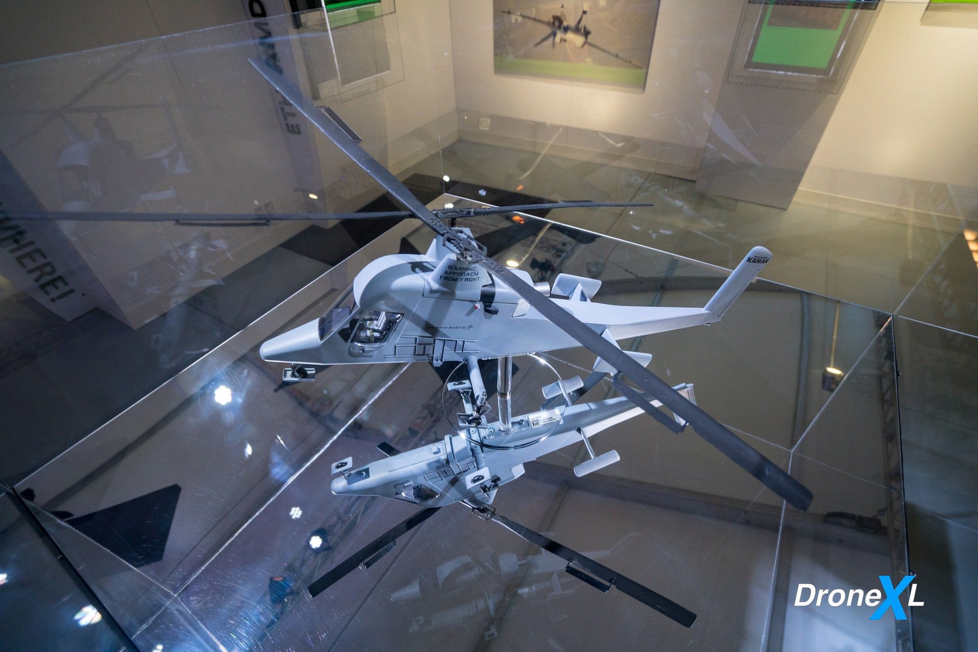 Kaman K-MAX exhibit on the unmanned logging helicopter that hauled cargo in Afghanistan.