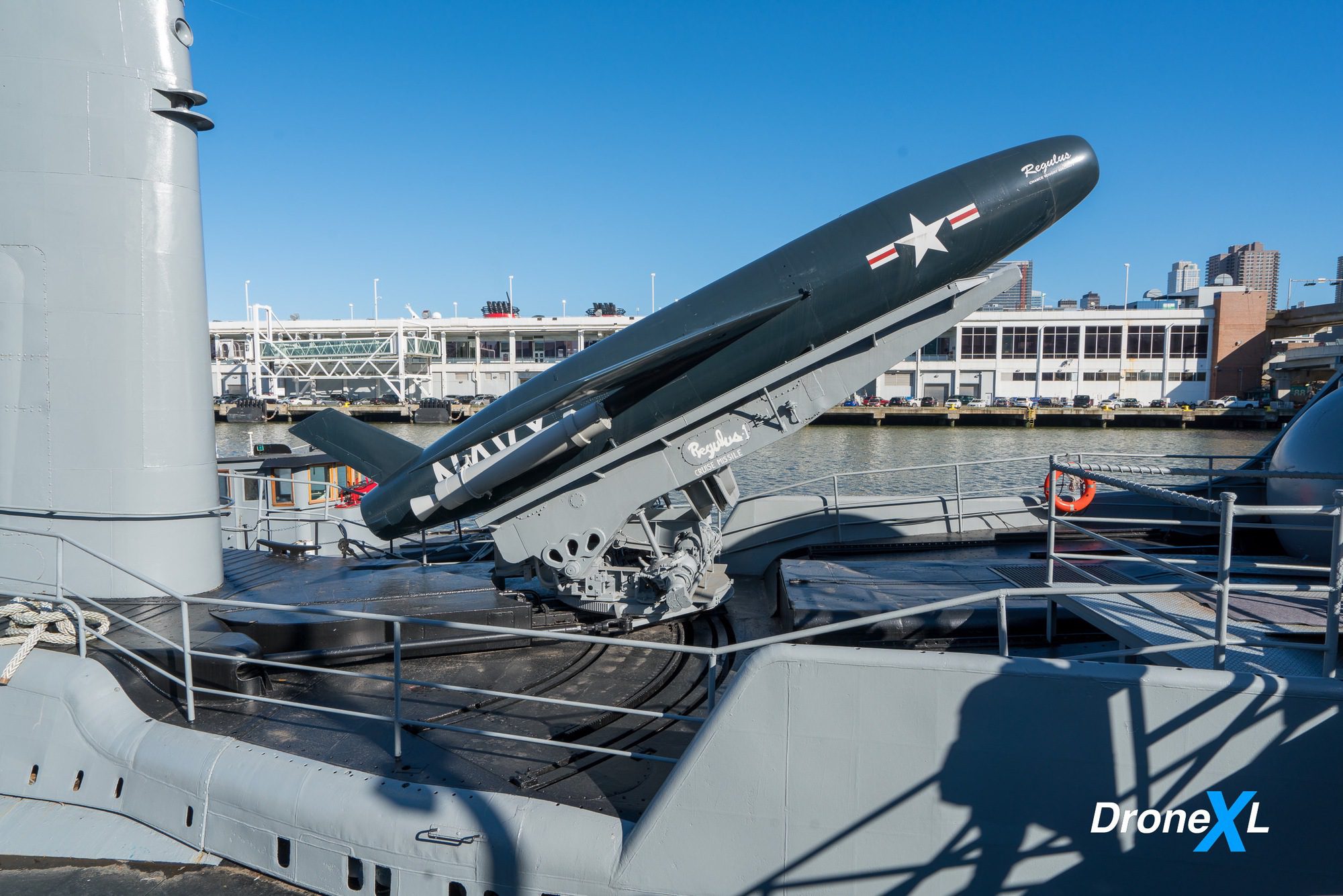 Wide view of the drone exhibition galleries aboard the aircraft carrier Intrepid.