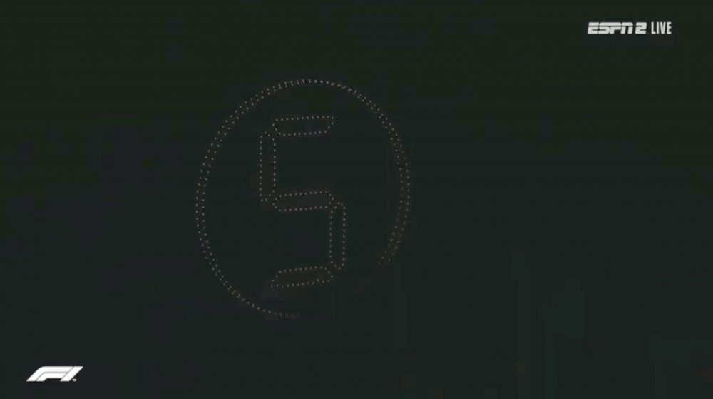 Drone light show forming the numeral five during a Formula 1 broadcast.