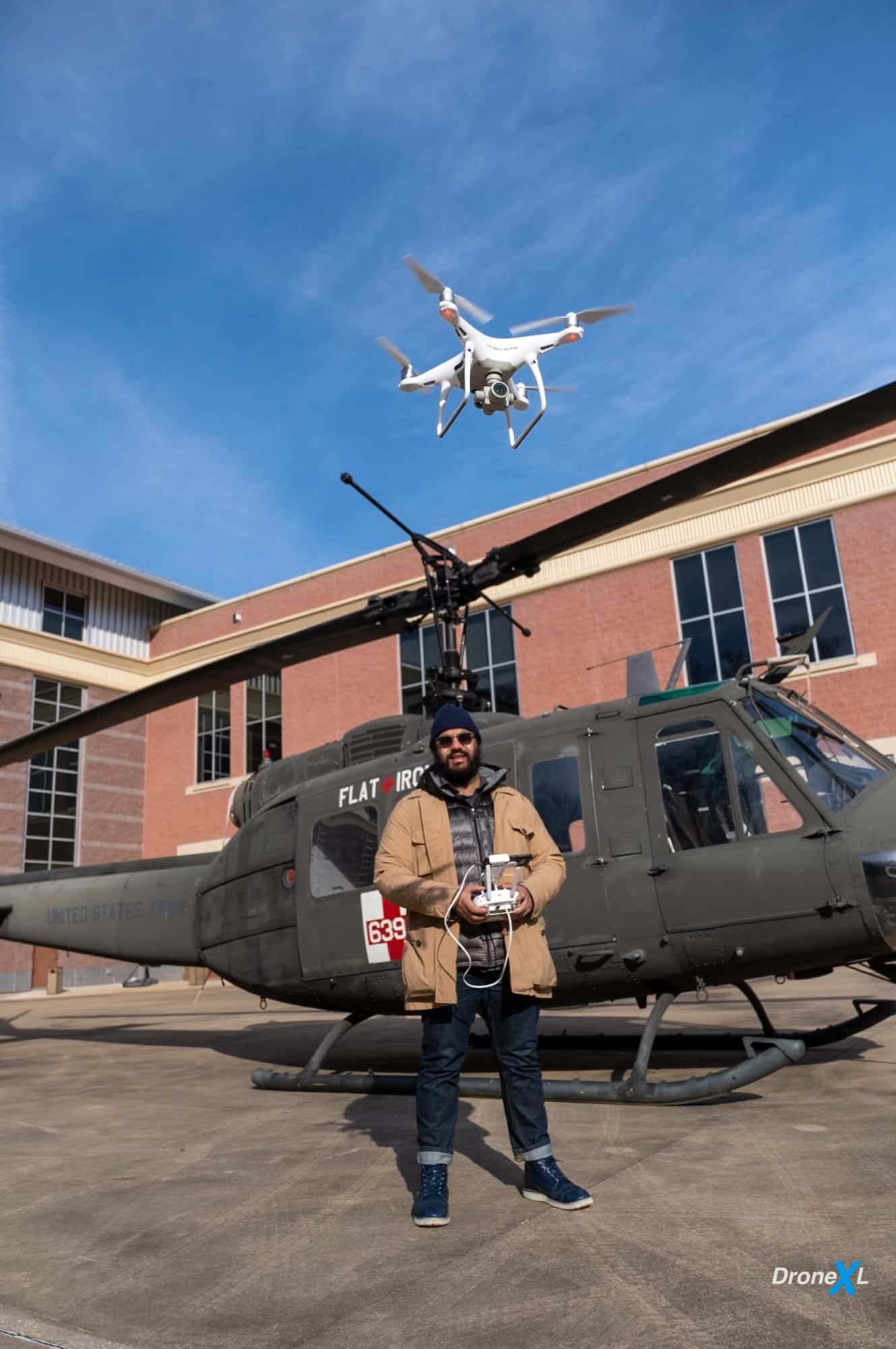Part 107 Certified Remote Pilot flying a drone well below 400 feet AGL.