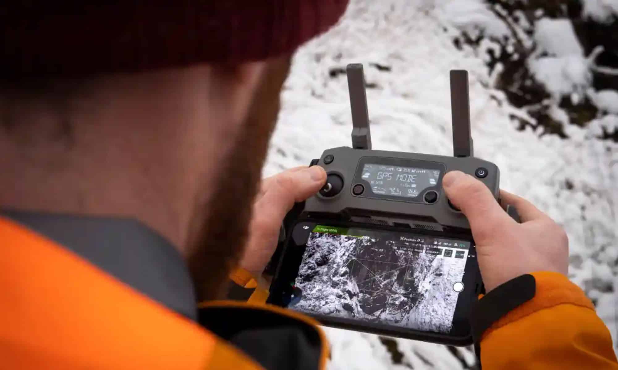 Jim Cooper launching a DJI Mavic 2 Zoom on a Highlands search.