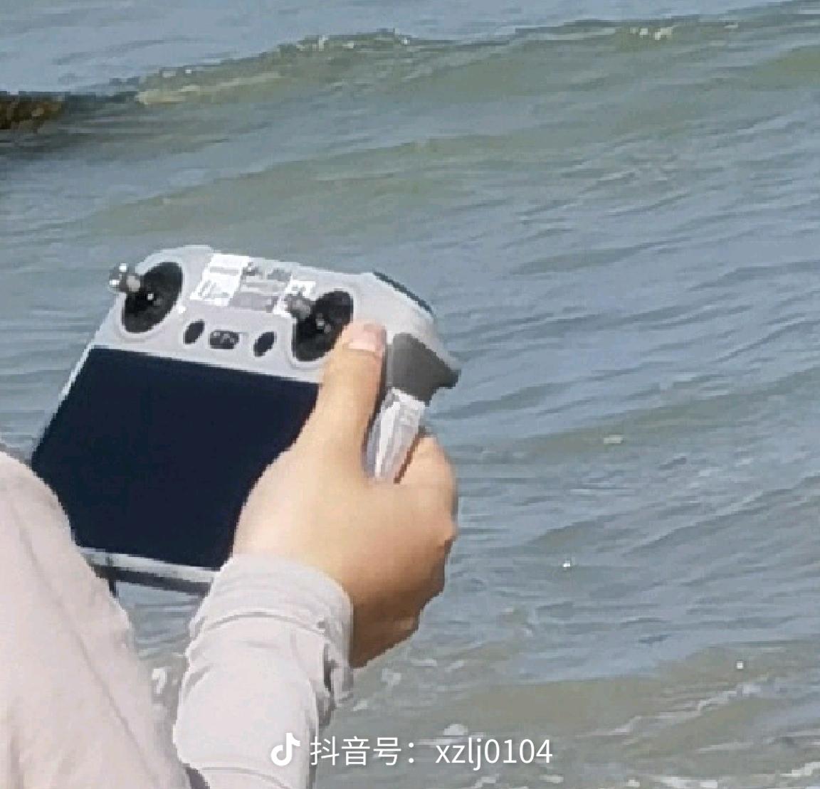 The new DJI RC controller and its built-in high-resolution display.