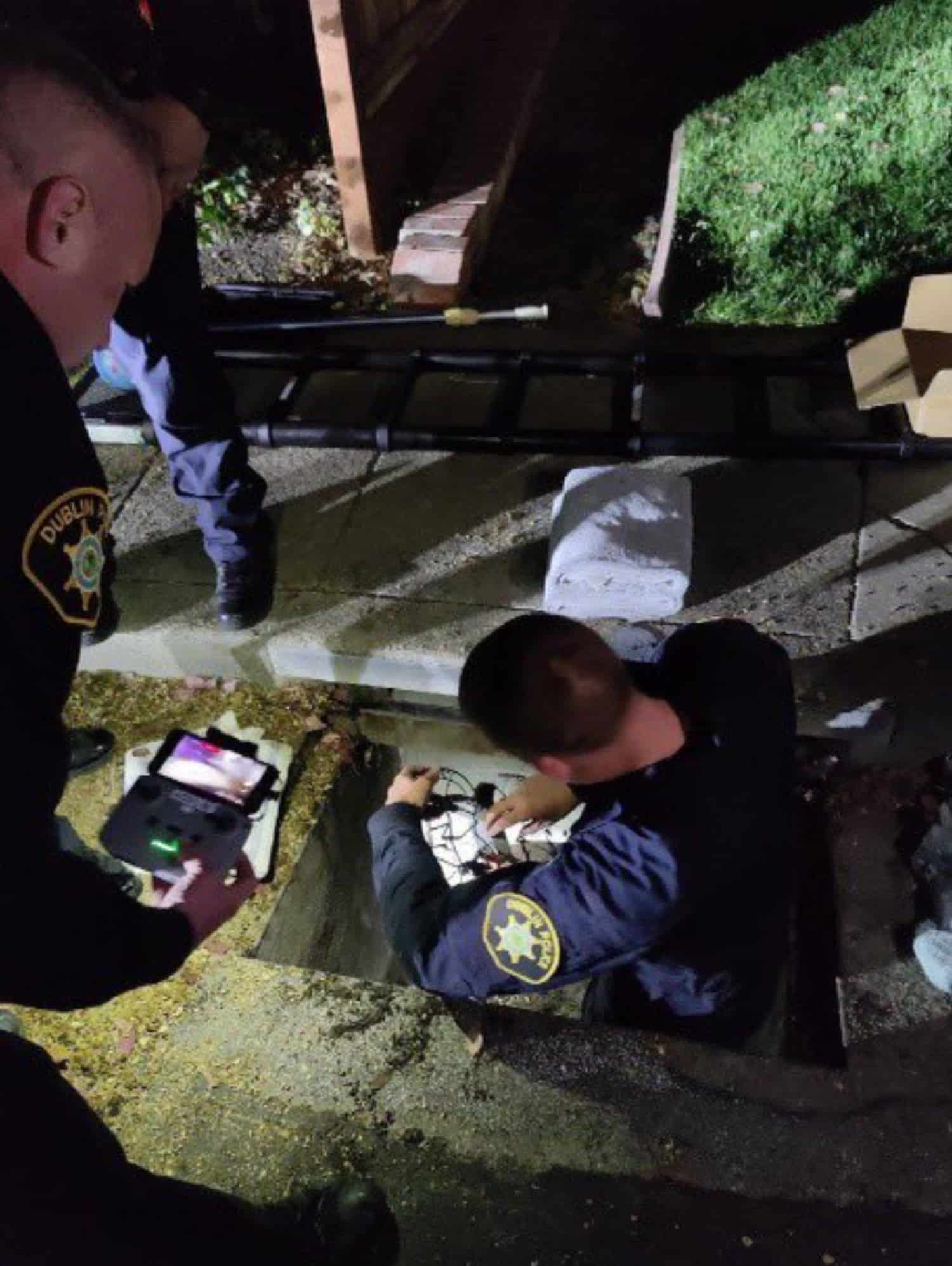 The ducklings located deep inside the storm drain by the sheriff's DJI Mini 2.