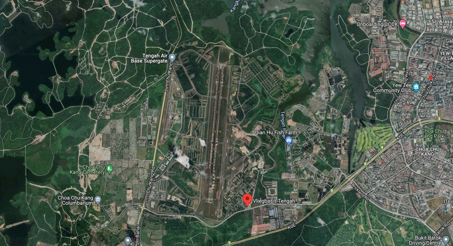 Satellite map of Tengah Air Base in Singapore with a dropped location pin.