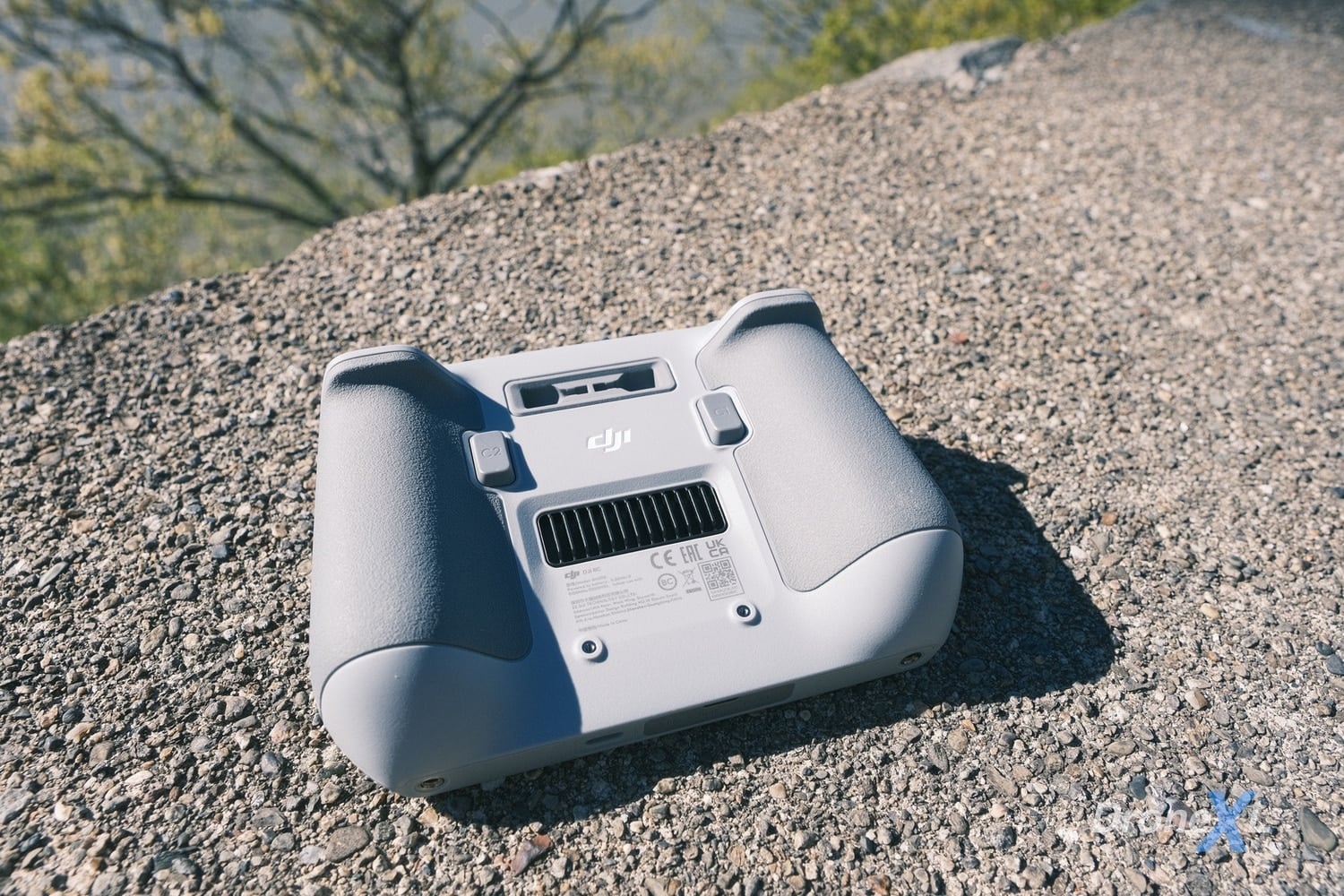 The DJI Mini 3 Pro beside the DJI RC during DroneXL's review shoot.