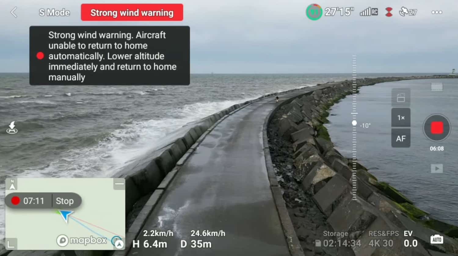 Strong wind warning on the DJI RC screen during the Mini 3 Pro flight.