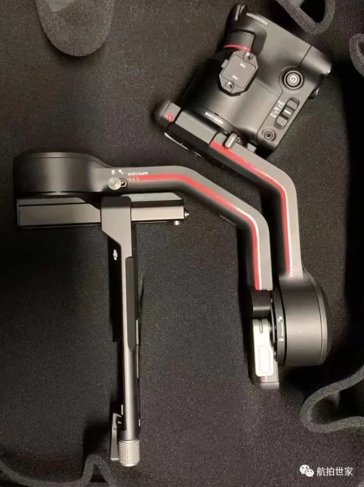 Leaked photo of the DJI RS3 gimbal standing on a dark textured surface.