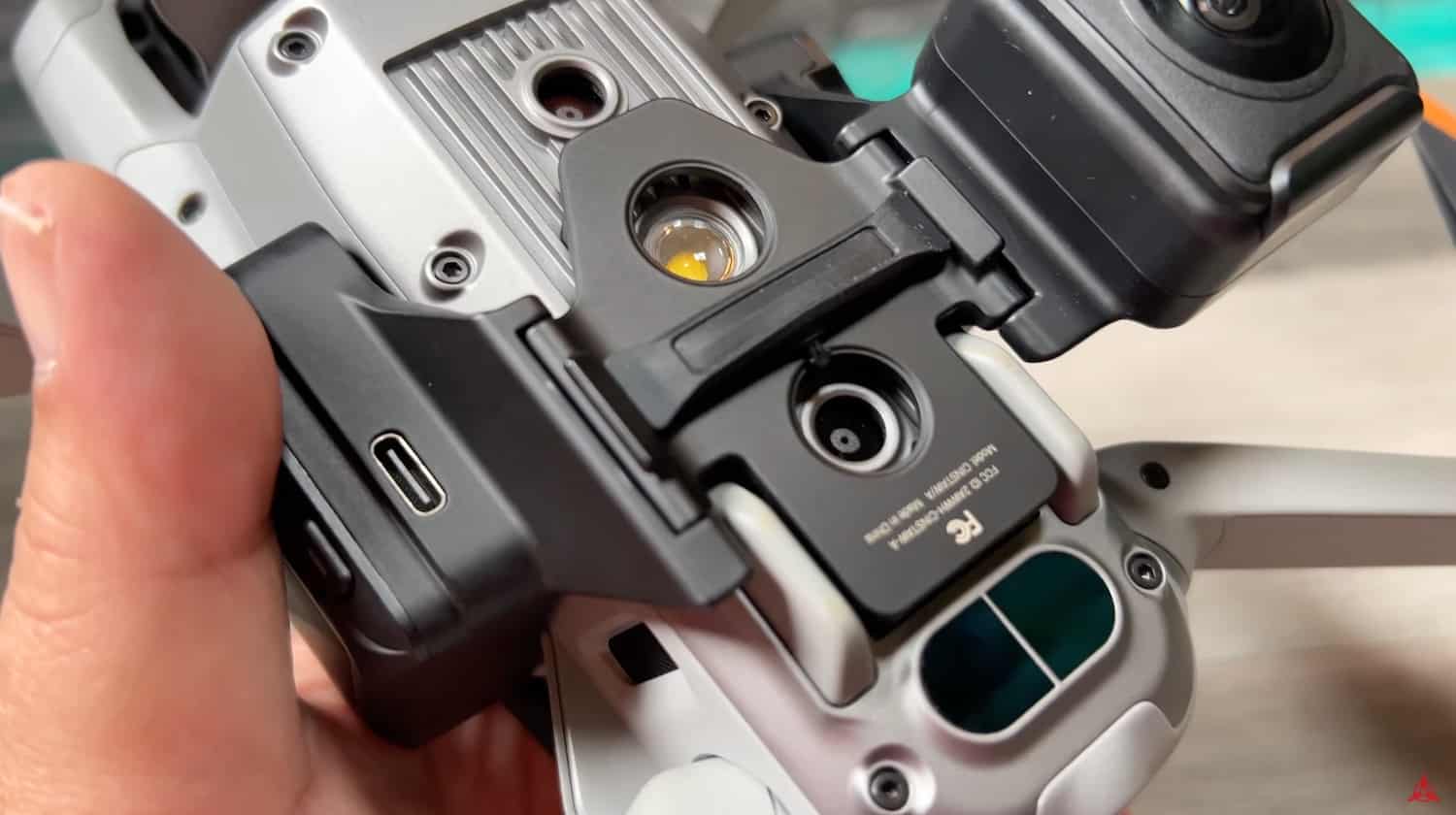Close-up of the Sphere mount clamped over the drone gimbal and sensors.