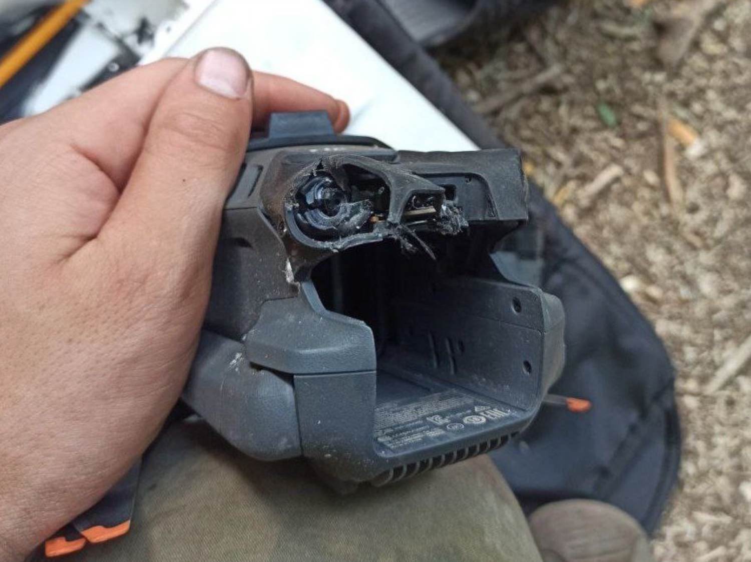 The backpack holding the wrecked DJI Mavic 3 that absorbed the blast fragments.
