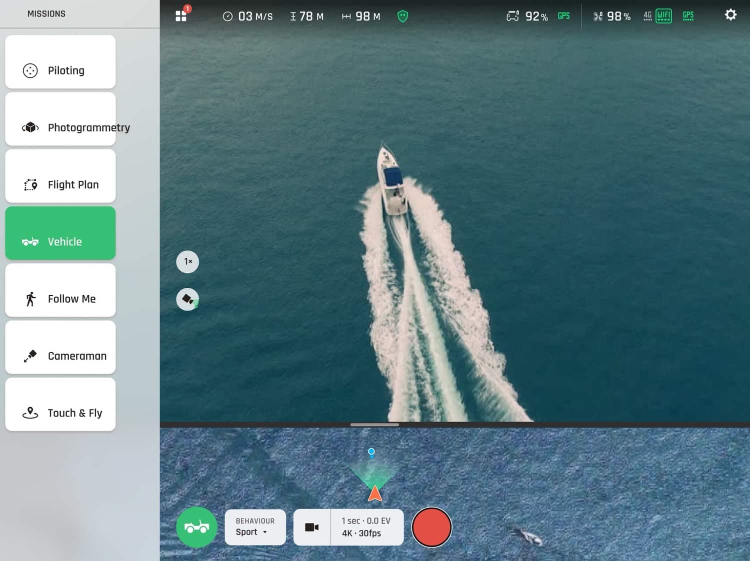 The Parrot ANAFI Ai folded down alongside its Skycontroller remote.