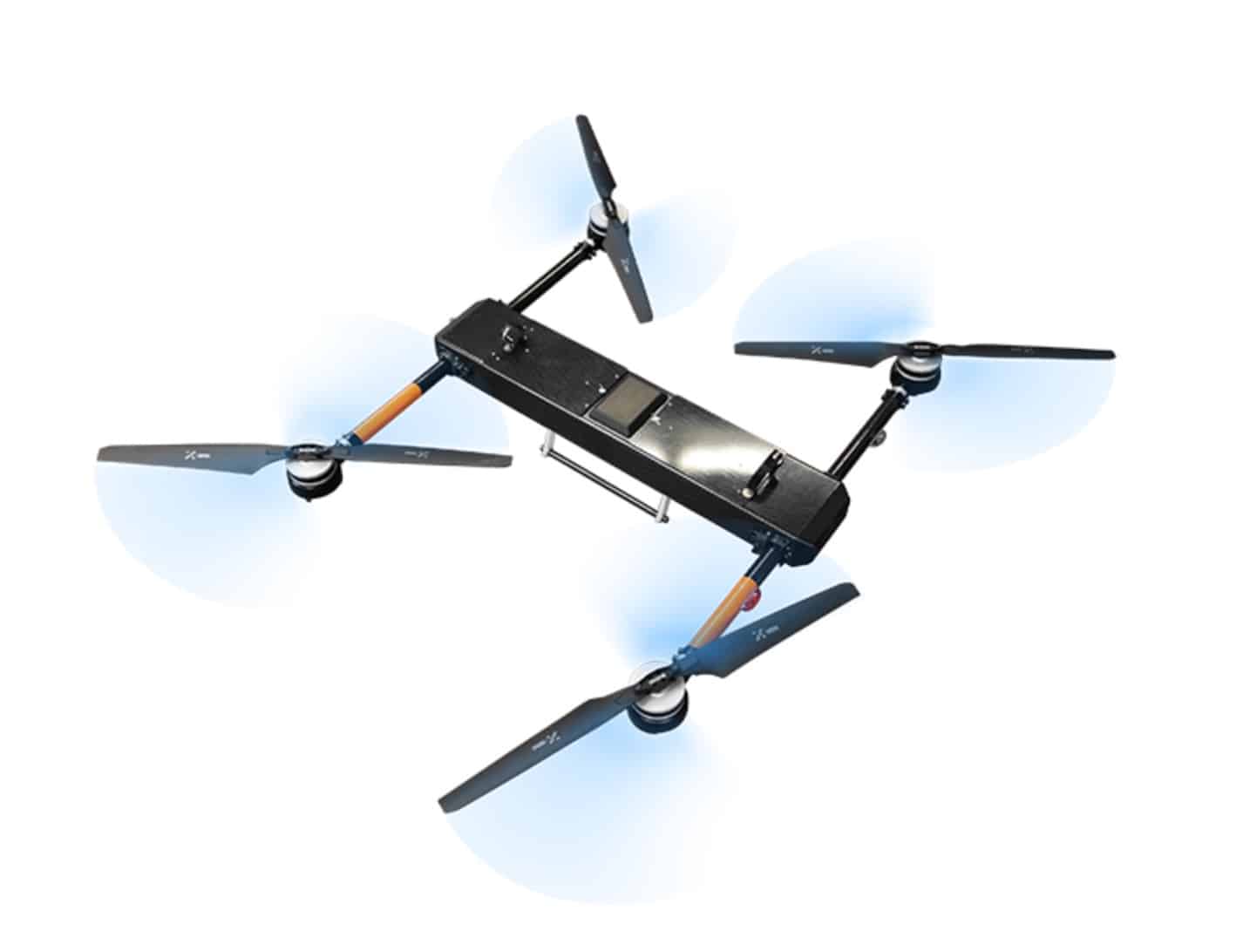 Draganfly cargo drone render with folding arms and spinning propellers on white.
