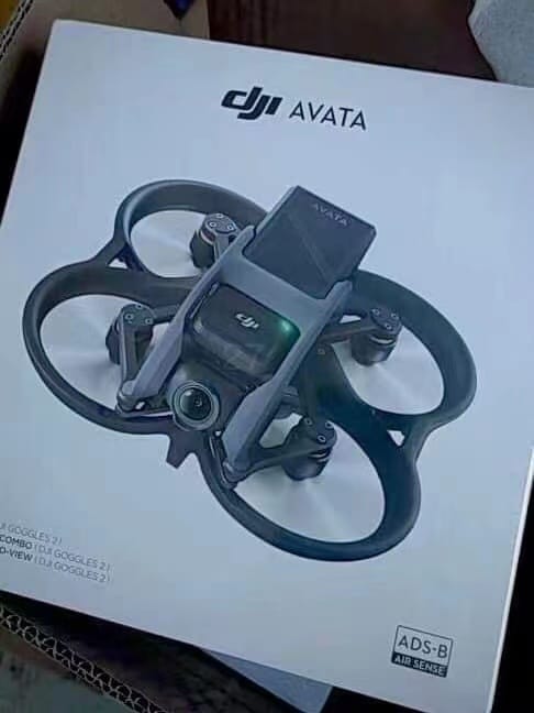 The DJI Avata in retail packaging, the box listing AirSense ADS-B among its features.