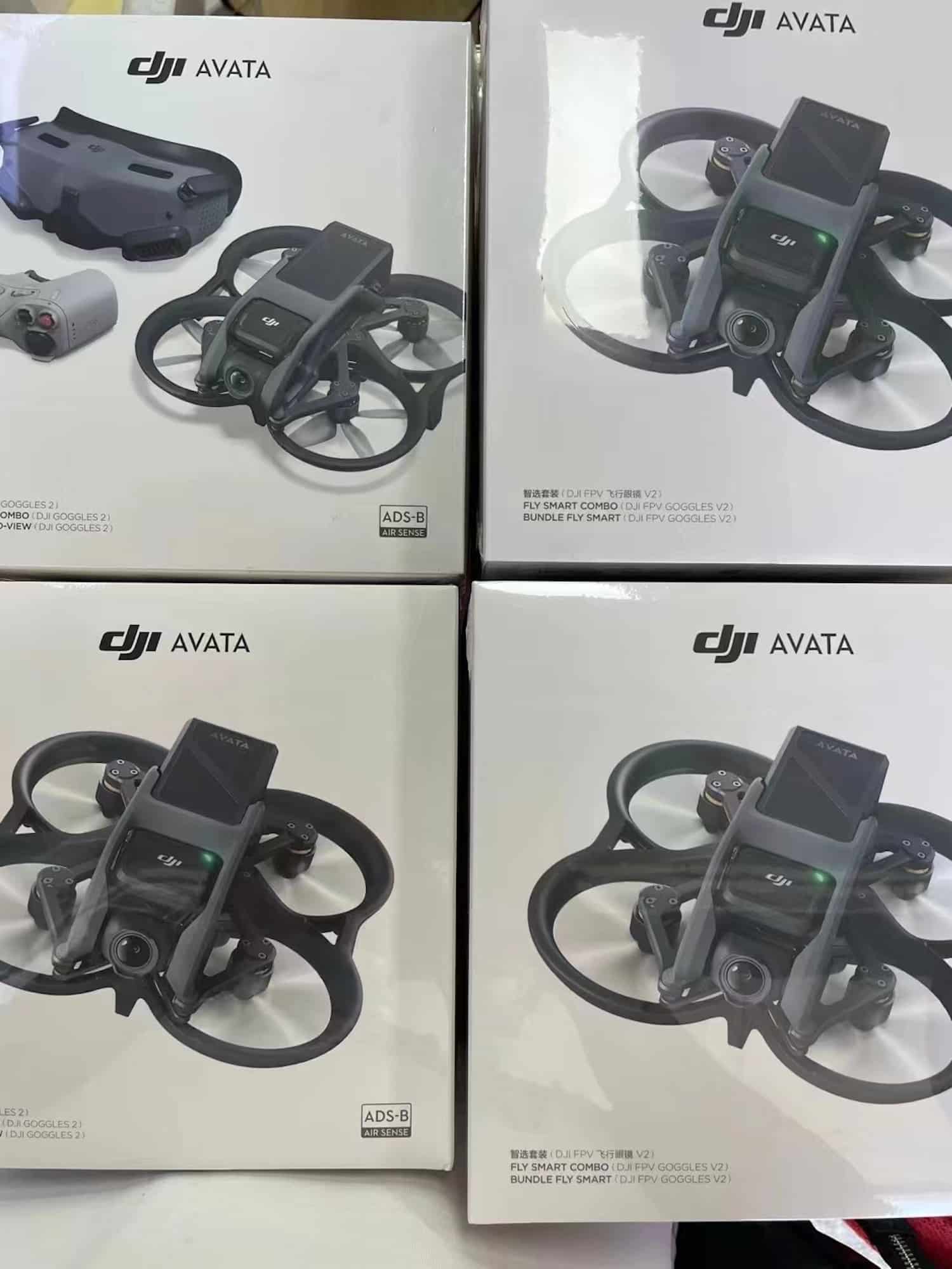 Stacked DJI Avata retail boxes showing the drone and goggles on the packaging.