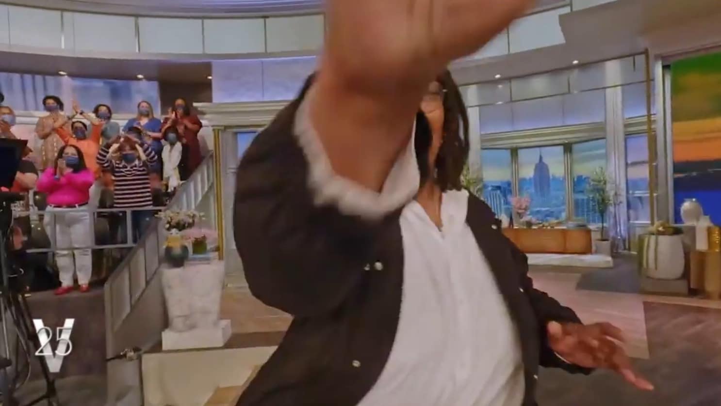 FPV drone view of a host greeting the audience on The View set.