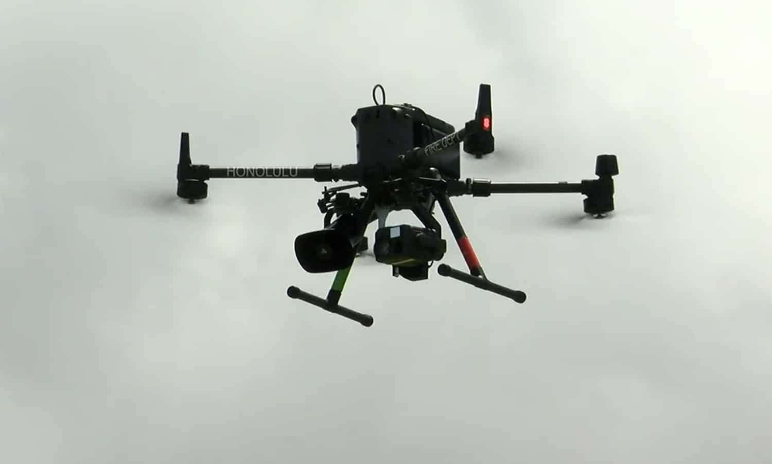Honolulu Fire Department multirotor hovers with its thermal camera payload fitted.